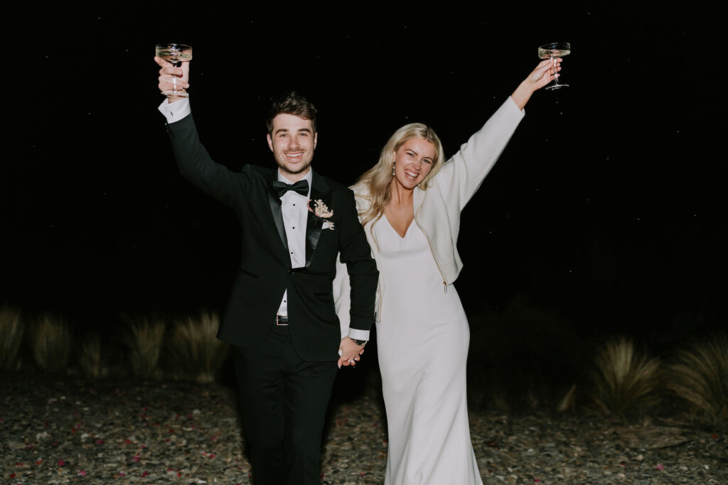 Bride and groom late night "cheers"