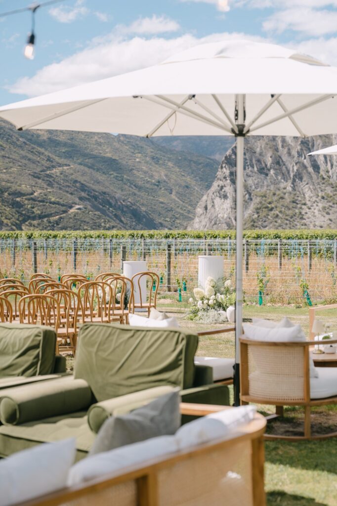 Wedding ceremony chairs set up facing the vineyard and mountains at Mt Rosa